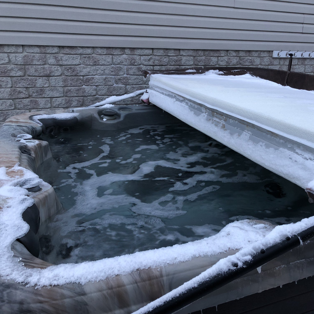 What can I do to stop my hot tub from turning into a frozen mess?